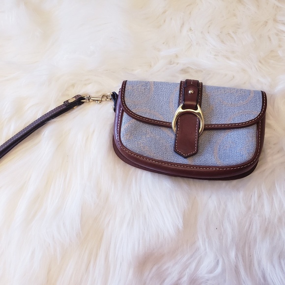 Dooney & Bourke Handbags - Small Dooney and bourke light blue wristlet.